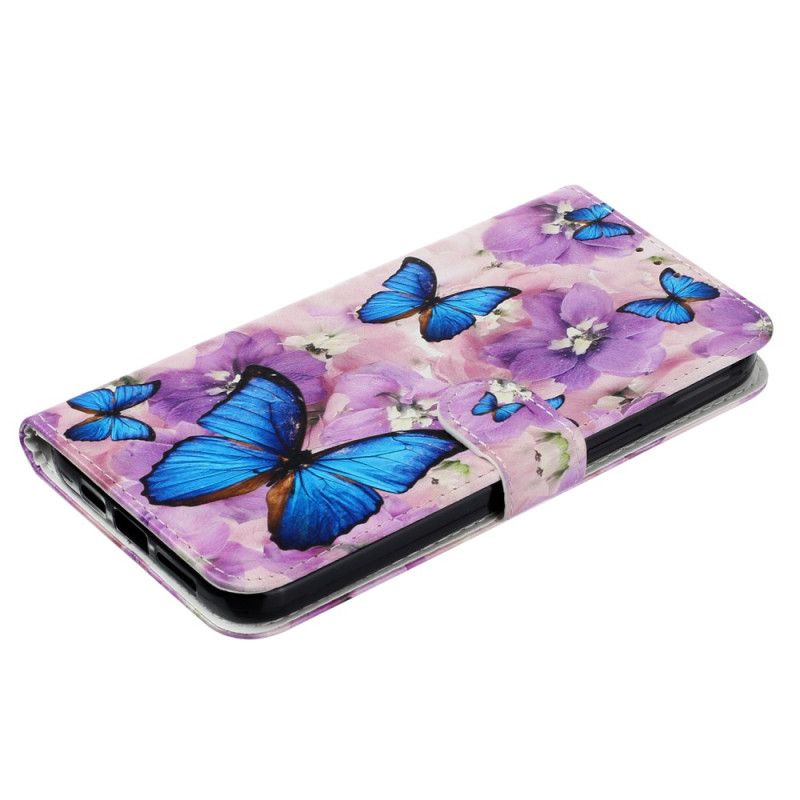 Folio Deksel iPhone 16 Plus Sommerfugler Og Lilla Blomster Med Stropp